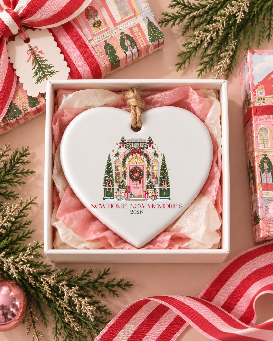 Heart-shaped new home Christmas ornament reading New Home, New Memories 2026 in gift box